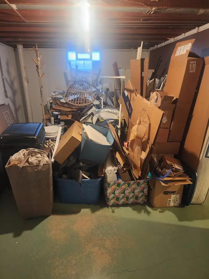 Roll-off dumpster container at job site for 6 Yard Dumpster Rental in Antrim